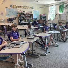8th Grade Capstone Passes the Torch