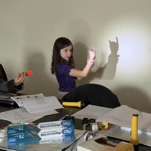 3rd Grade Explores How Blocked Light Creates Shadows of Different Size and Shape 